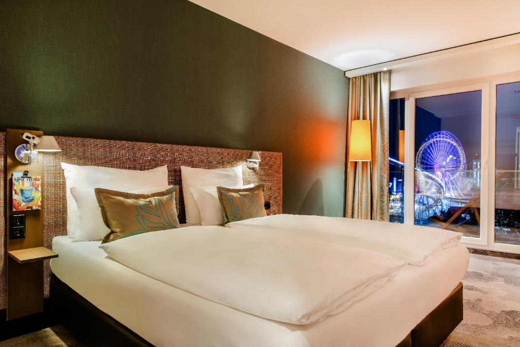 Posteľ alebo postele v izbe v ubytovaní Motel One Wien-Prater