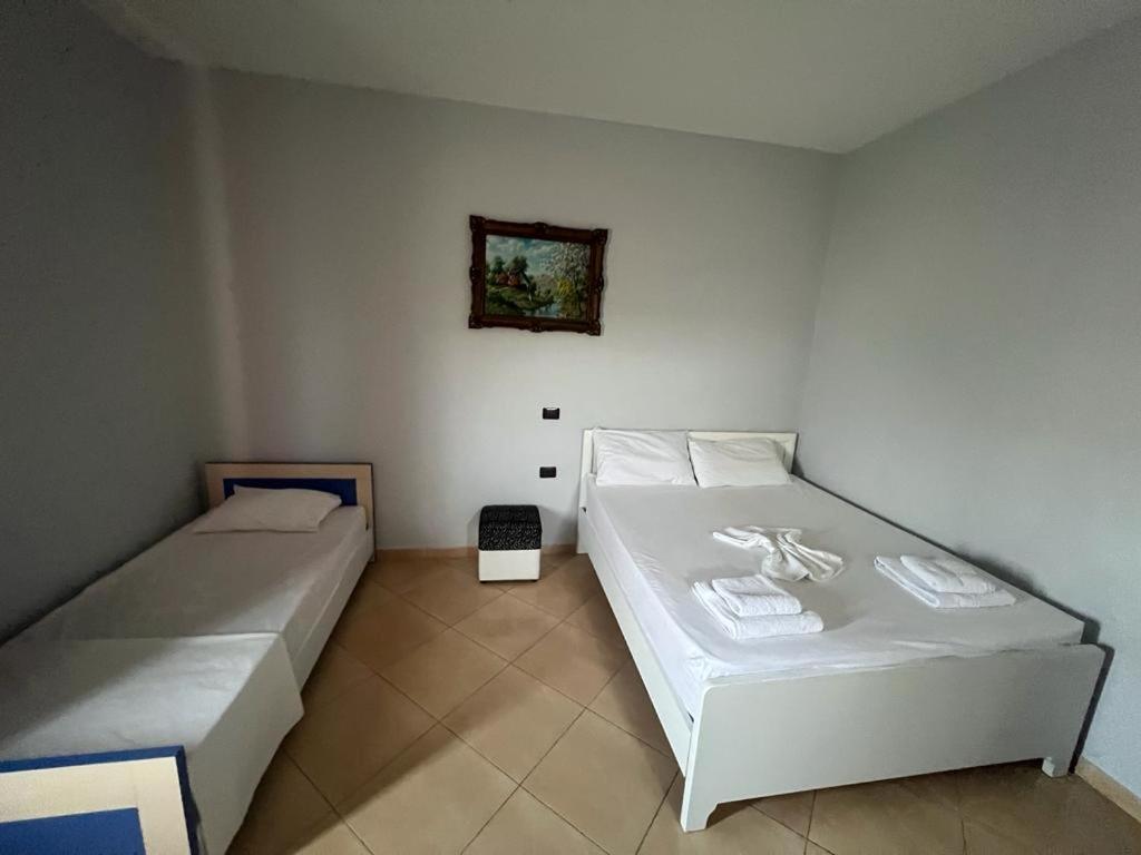 Postel nebo postele na pokoji v ubytování Vila Olti
