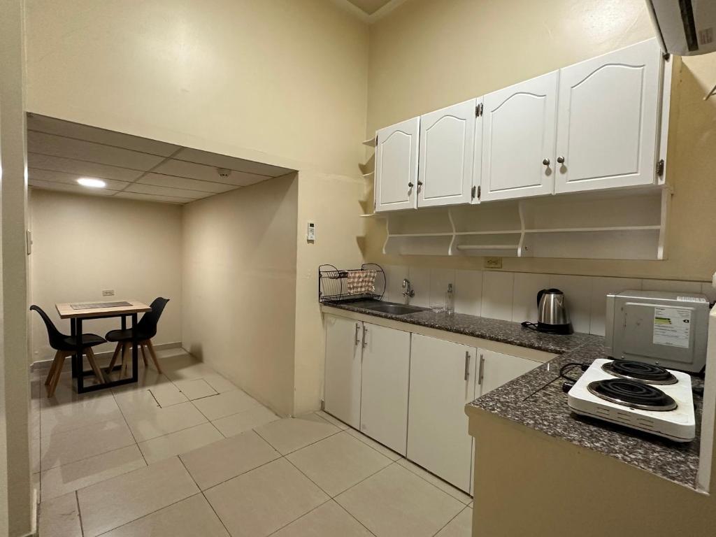 Kuchyň nebo kuchyňský kout v ubytování Hostal Posada Del Sol
