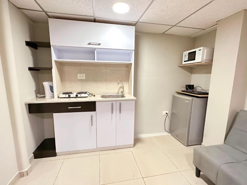 Kuchyň nebo kuchyňský kout v ubytování Hostal Posada Del Sol
