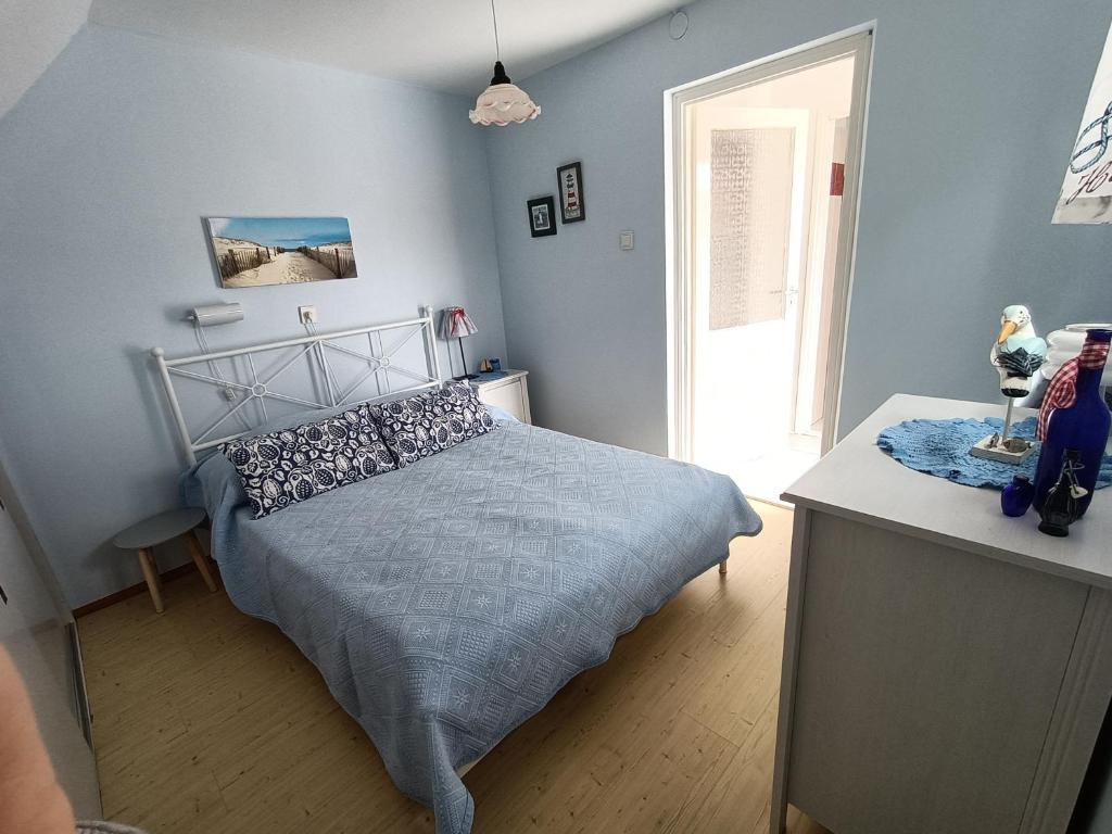 Posteľ alebo postele v izbe v ubytovaní Kardos Residence Siófok
