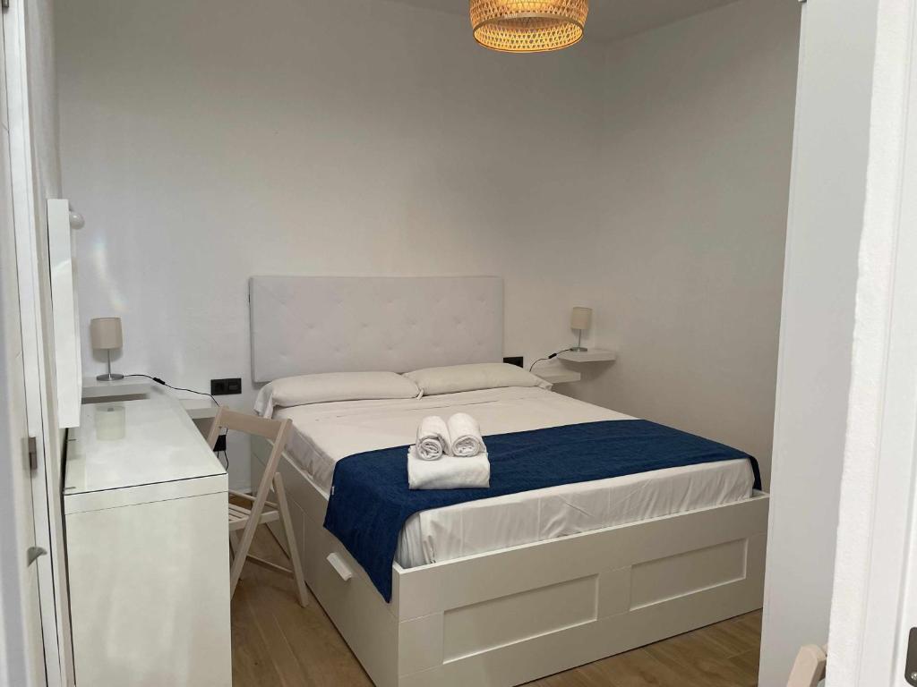 Posteľ alebo postele v izbe v ubytovaní Sunlight Málaga Centro