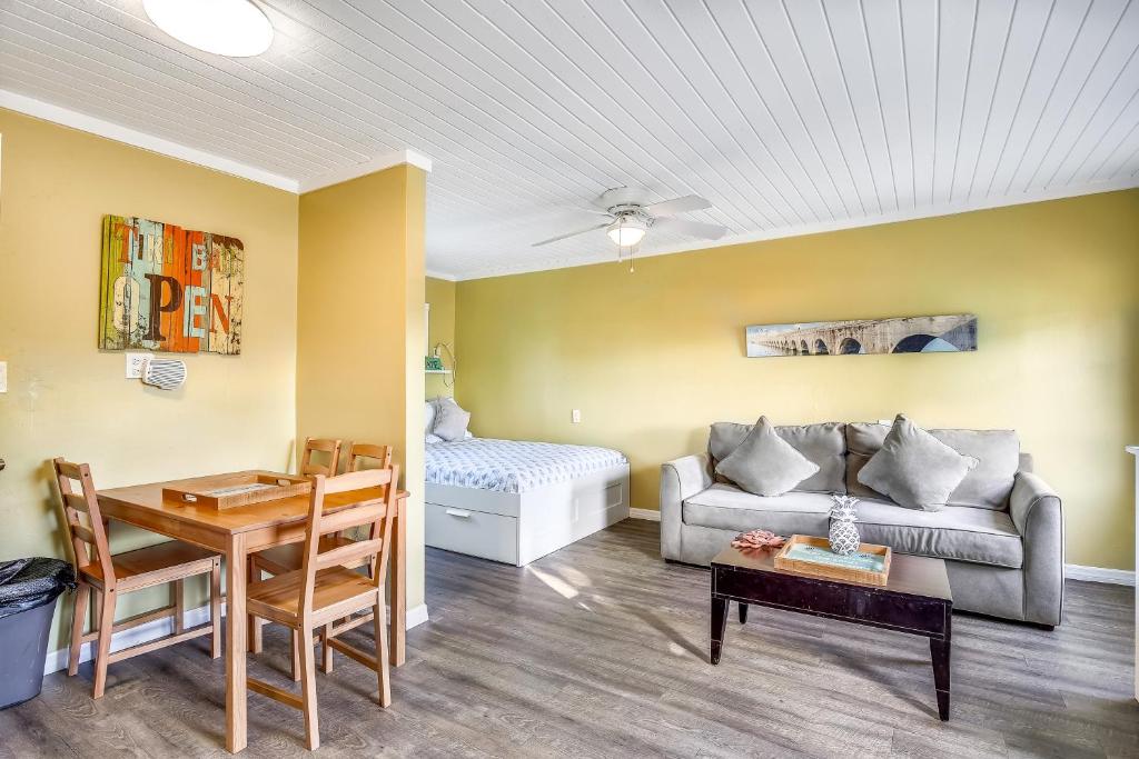 a living room with a couch and a table at Fisherman's Retreat in Conch Key