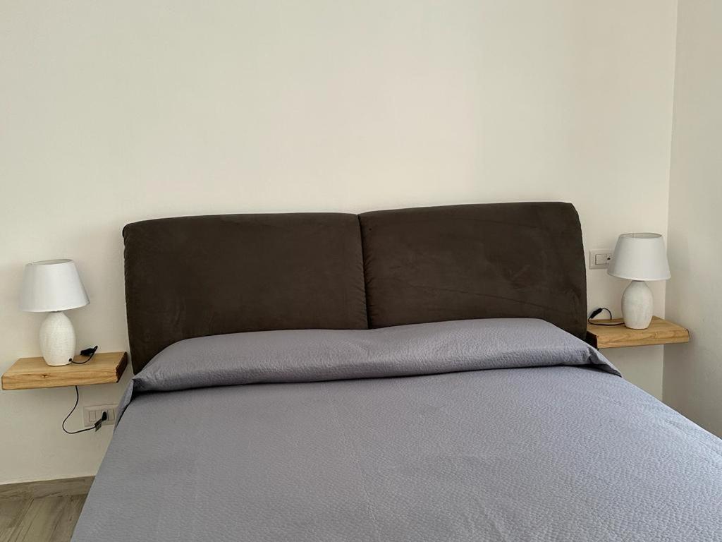 Ein Bett oder Betten in einem Zimmer der Unterkunft Mazzella Home