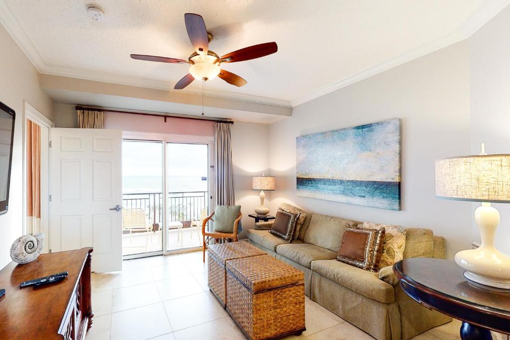a living room with a couch and a ceiling fan at Westwinds 4754 in Destin