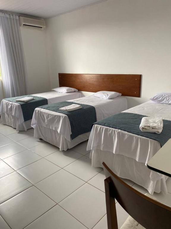Postel nebo postele na pokoji v ubytování Valparaiso Hotel