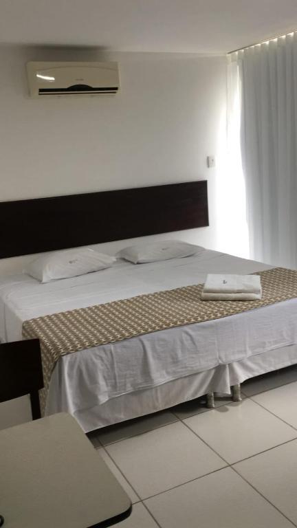 Postel nebo postele na pokoji v ubytování Valparaiso Hotel