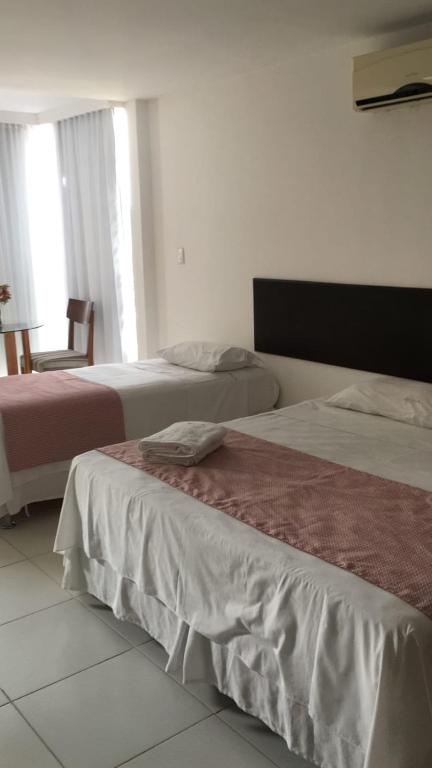 Postel nebo postele na pokoji v ubytování Valparaiso Hotel