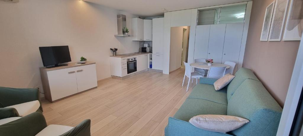 A cozinha ou kitchenette de Bianca Apartment