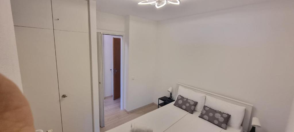 Uma cama ou camas num quarto em Bianca Apartment