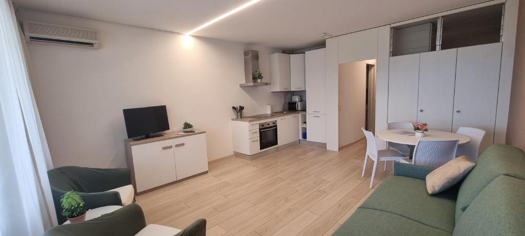 A cozinha ou kitchenette de Bianca Apartment