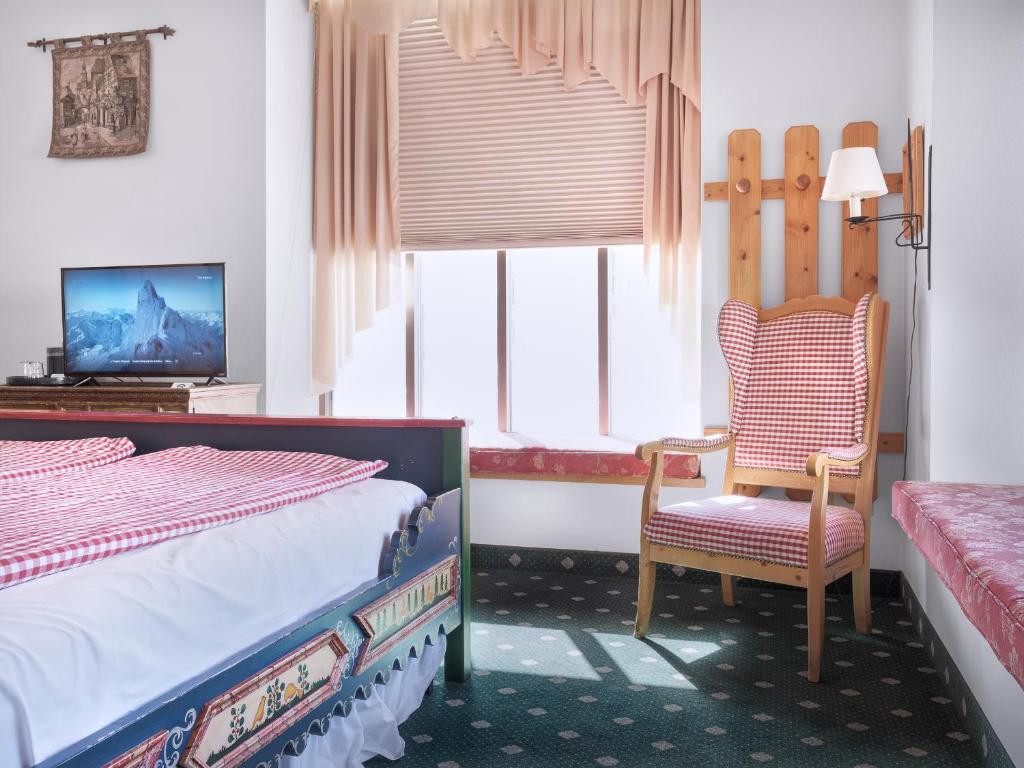 Postel nebo postele na pokoji v ubytování Hotel Pension Anna