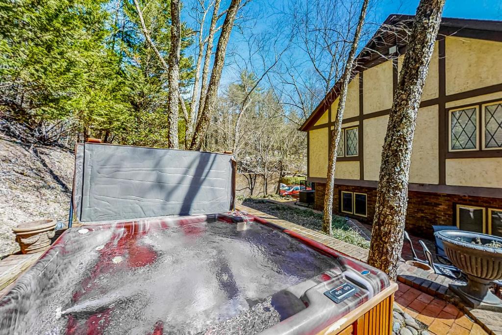 a hot tub in the backyard of a house at Smoky Mountain Estate in Sevierville