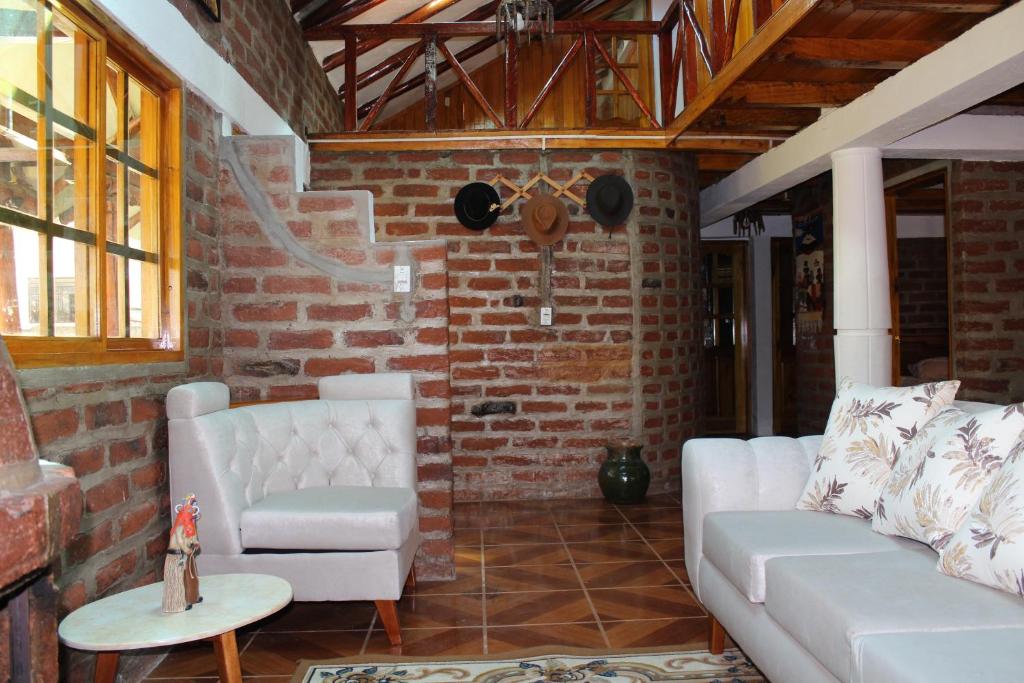 Posezení v ubytování Rumipaxi Lodge