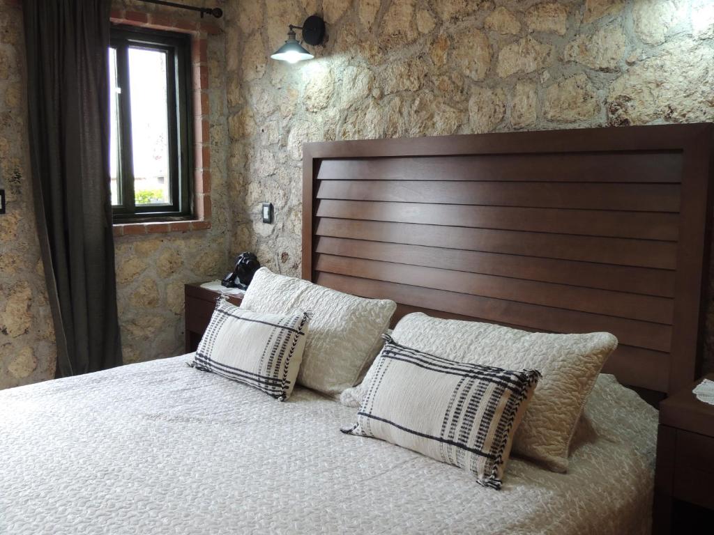 Postel nebo postele na pokoji v ubytování Cabañas Big Mountain