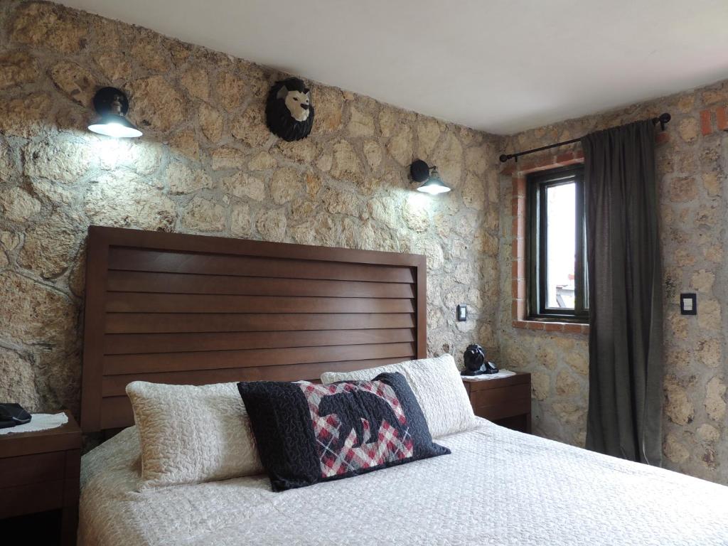 Postel nebo postele na pokoji v ubytování Cabañas Big Mountain