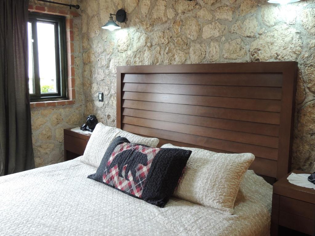 Postel nebo postele na pokoji v ubytování Cabañas Big Mountain