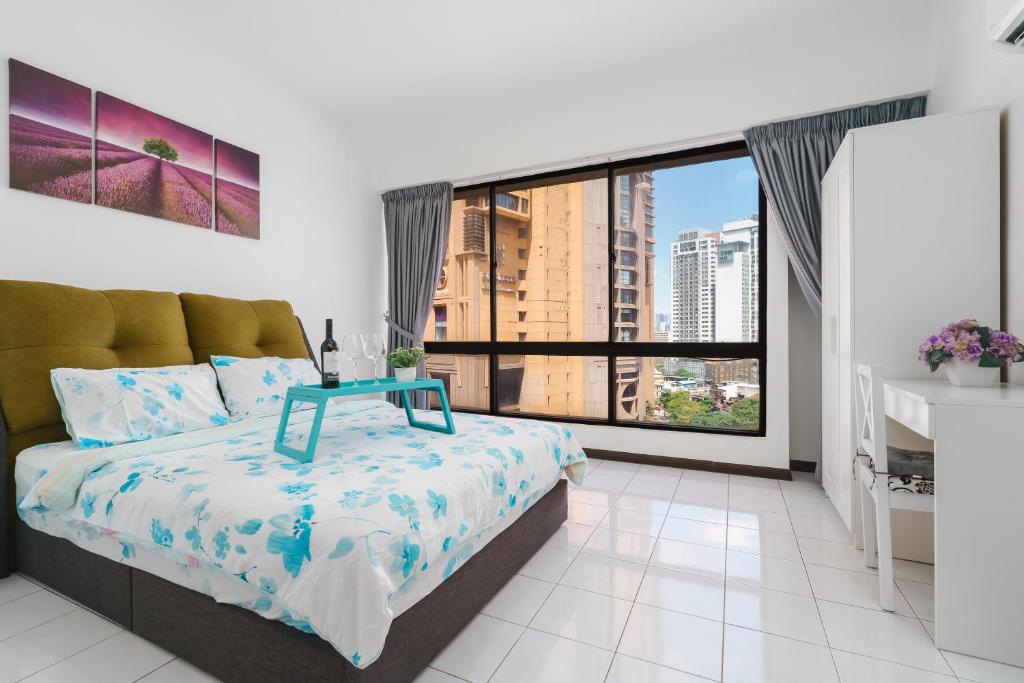 Voodi või voodid majutusasutuse Bukit Bintang Times Sq With 3 Bedroom 74 toas