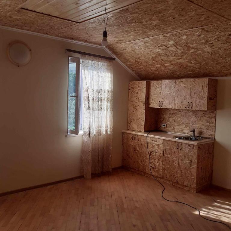 Kuchyň nebo kuchyňský kout v ubytování Guest House Sevan