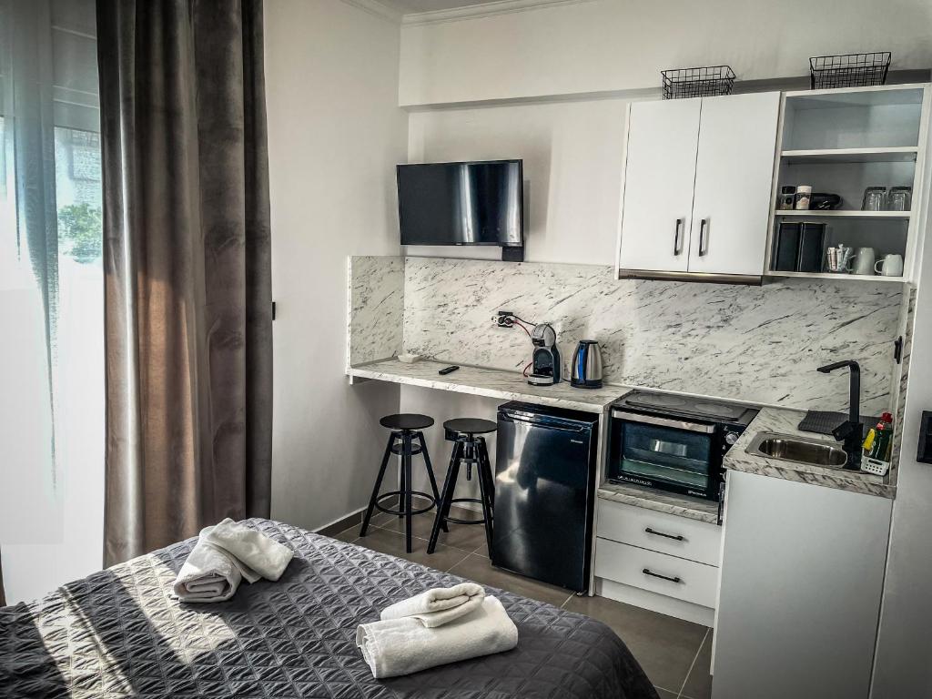 Kuchyň nebo kuchyňský kout v ubytování The Room