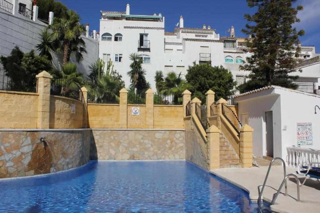 Bazén v ubytování Villa Marisol Estudio EUROPA nebo v jeho okolí