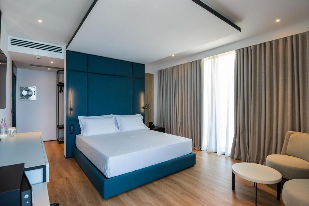Postel nebo postele na pokoji v ubytování Mango Luxury Resorts