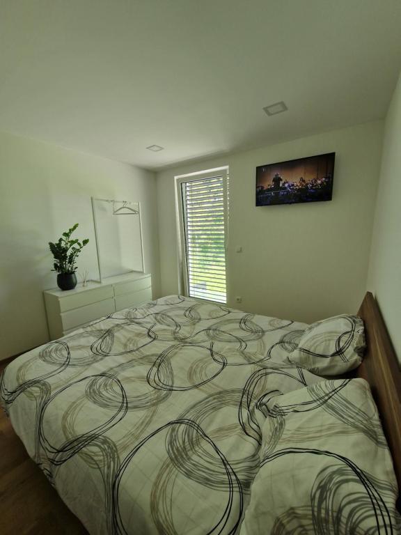 Postelja oz. postelje v sobi nastanitve Cona rooms