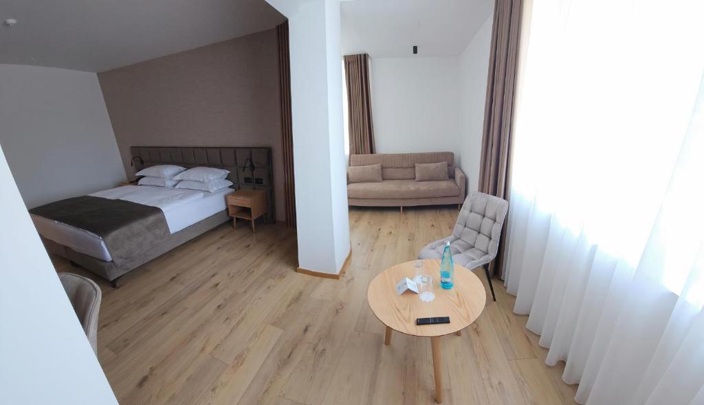 Postel nebo postele na pokoji v ubytování SIBB Hotel
