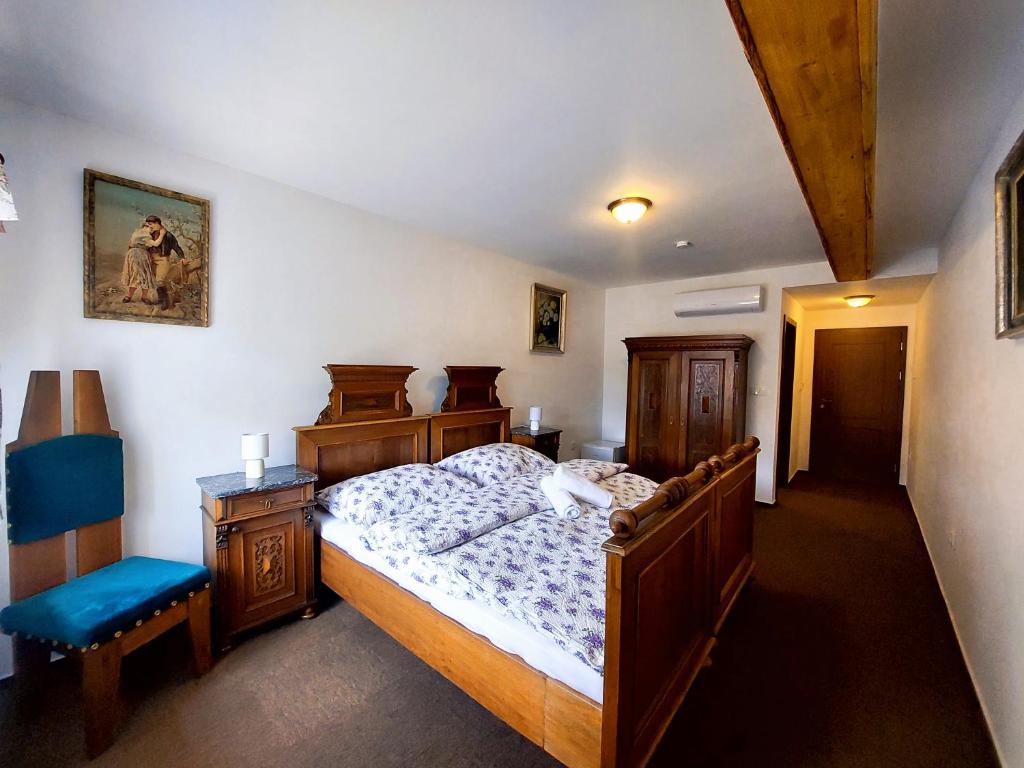 מיטה או מיטות בחדר ב-Penzion U Jindry