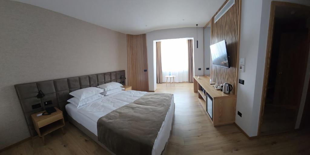 Postel nebo postele na pokoji v ubytování SIBB Hotel