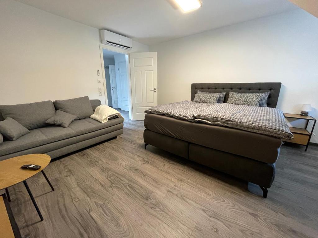 Postel nebo postele na pokoji v ubytování SWID Appartement 9