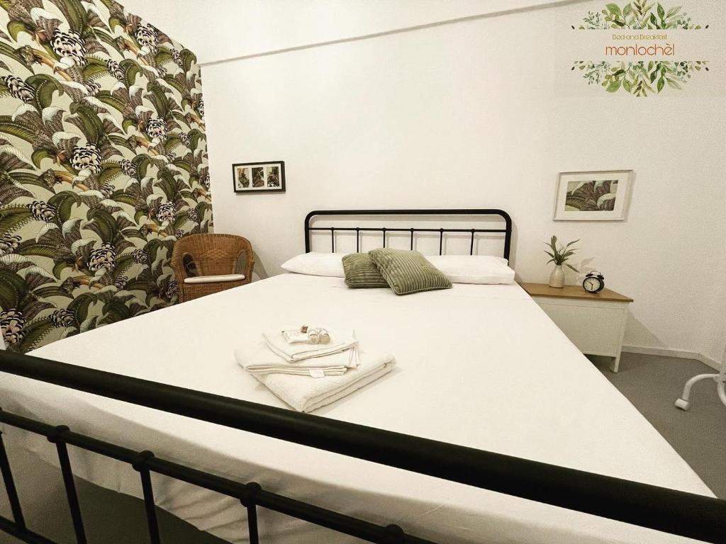 Postel nebo postele na pokoji v ubytování Monlochèl