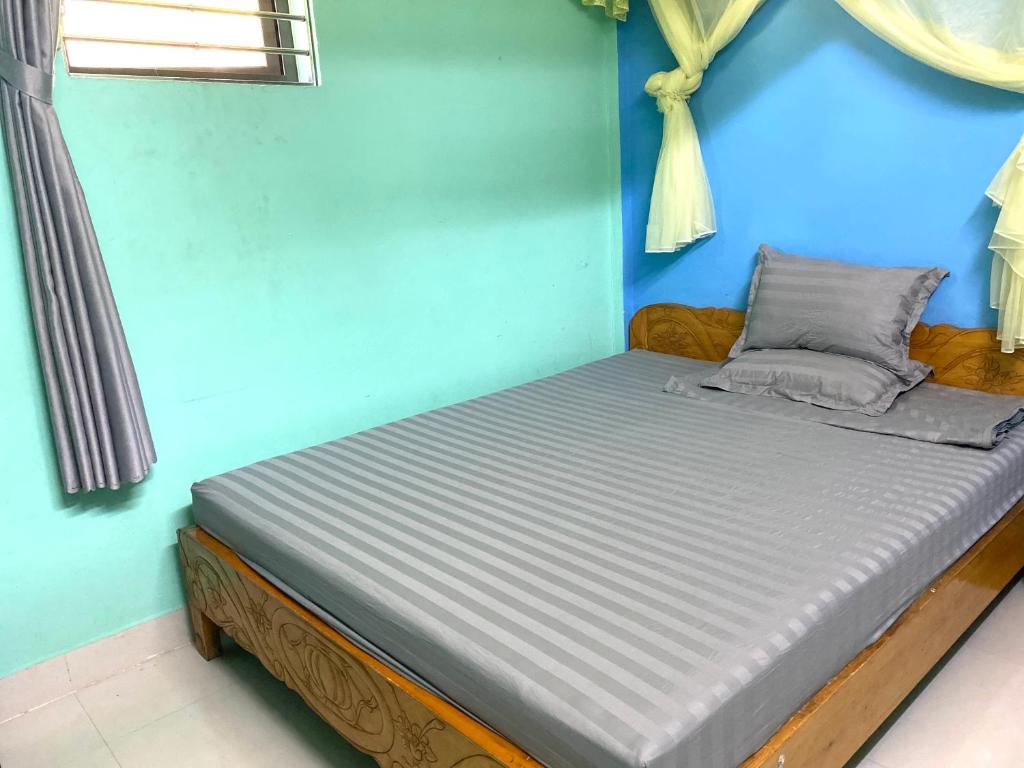 Postel nebo postele na pokoji v ubytování Lam Giang Homestay Dong Van