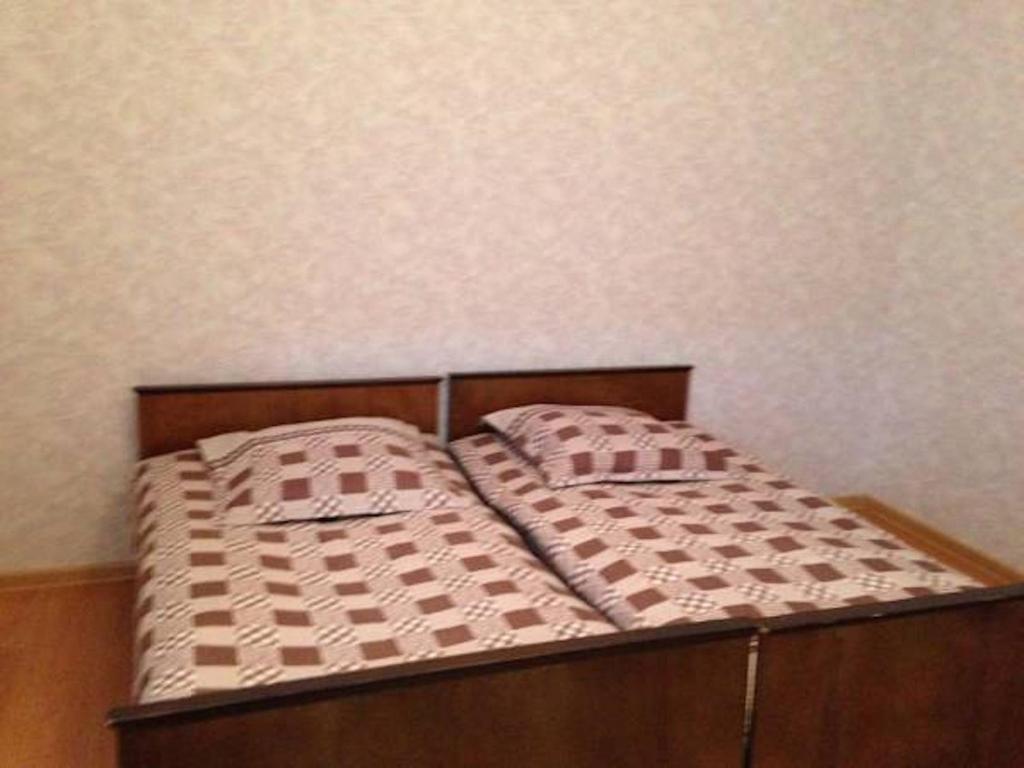 Llit o llits en una habitació de Guest House Besarioni