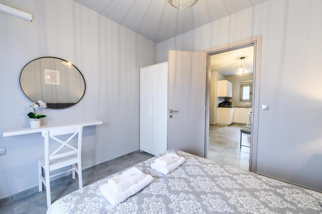 Postel nebo postele na pokoji v ubytování Dalie Luxury Suites