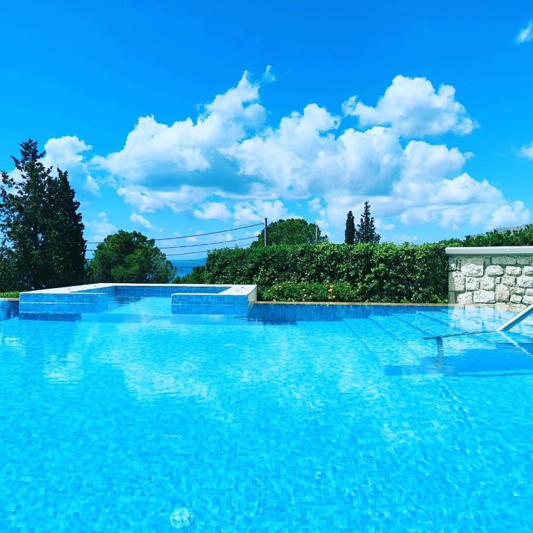 The swimming pool at or close to Villa CostaMare - enjoy lazy days on the private Pool-Jacuzzi