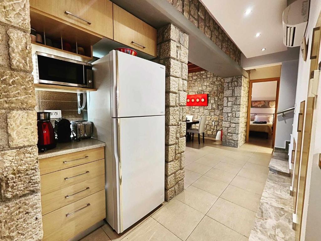 A kitchen or kitchenette at Villa CostaMare - enjoy lazy days on the private Pool-Jacuzzi