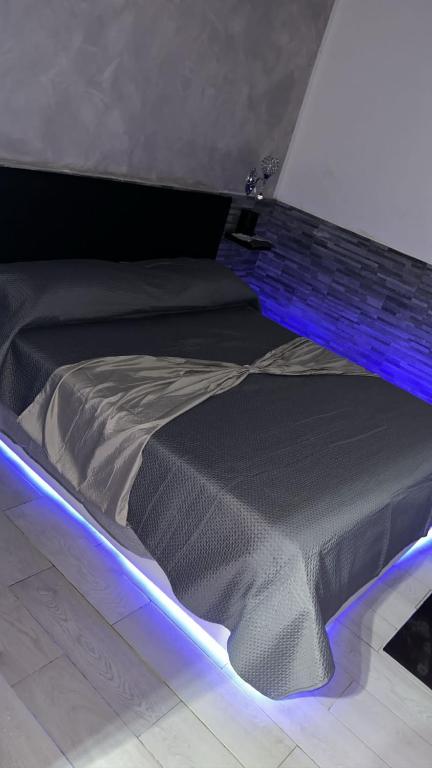 Кровать или кровати в номере La piccola casetta del centro