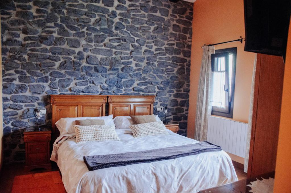Postel nebo postele na pokoji v ubytování Lezamakoetxe