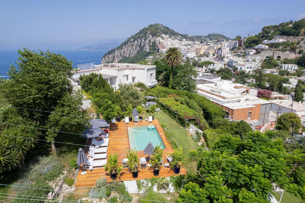 an aerial view of a villa with a swimming pool at Villa La Pergola Capri in Capri