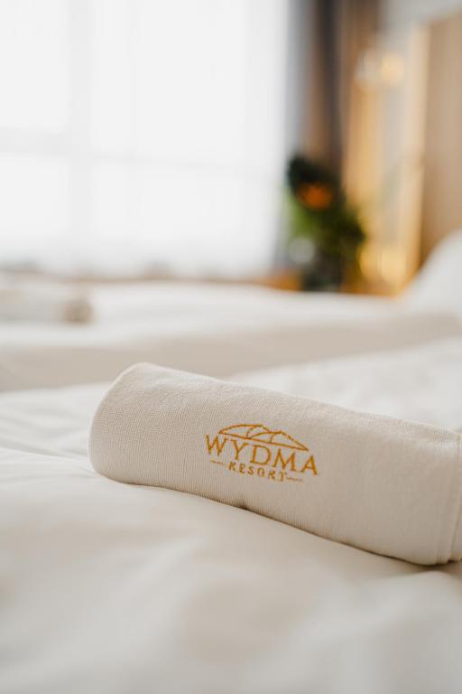 Postel nebo postele na pokoji v ubytování WYDMA Resort Medi & SPA - Normobaria