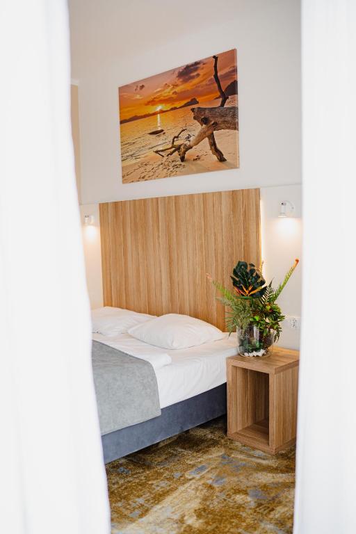 Postel nebo postele na pokoji v ubytování WYDMA Resort Medi & SPA - Normobaria