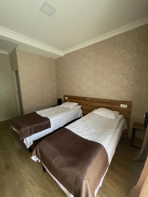 Postel nebo postele na pokoji v ubytování Aldema