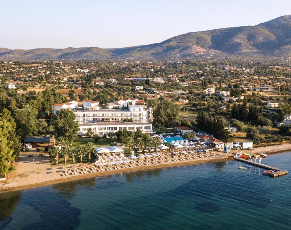 - une vue aérienne sur un complexe sur l'eau dans l'établissement Brown Beach Evia Island, All Inclusive in Eretria, a member of Brown Hotels, à Eretria