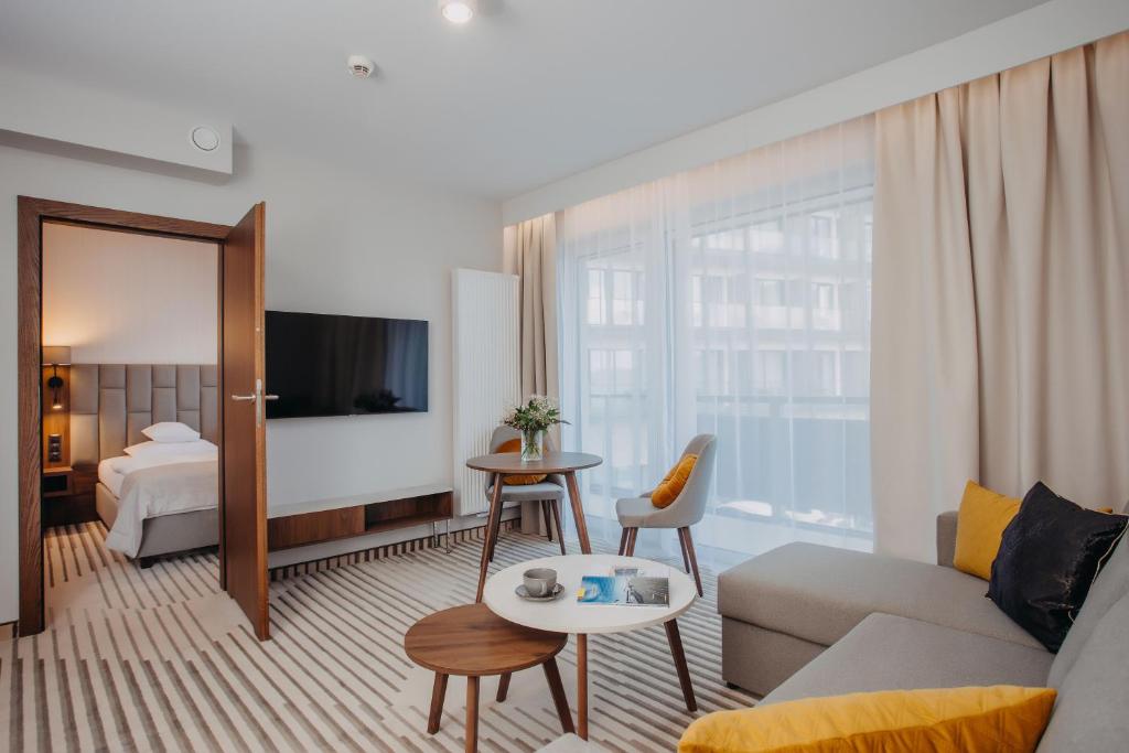Postel nebo postele na pokoji v ubytování Elements Apartments