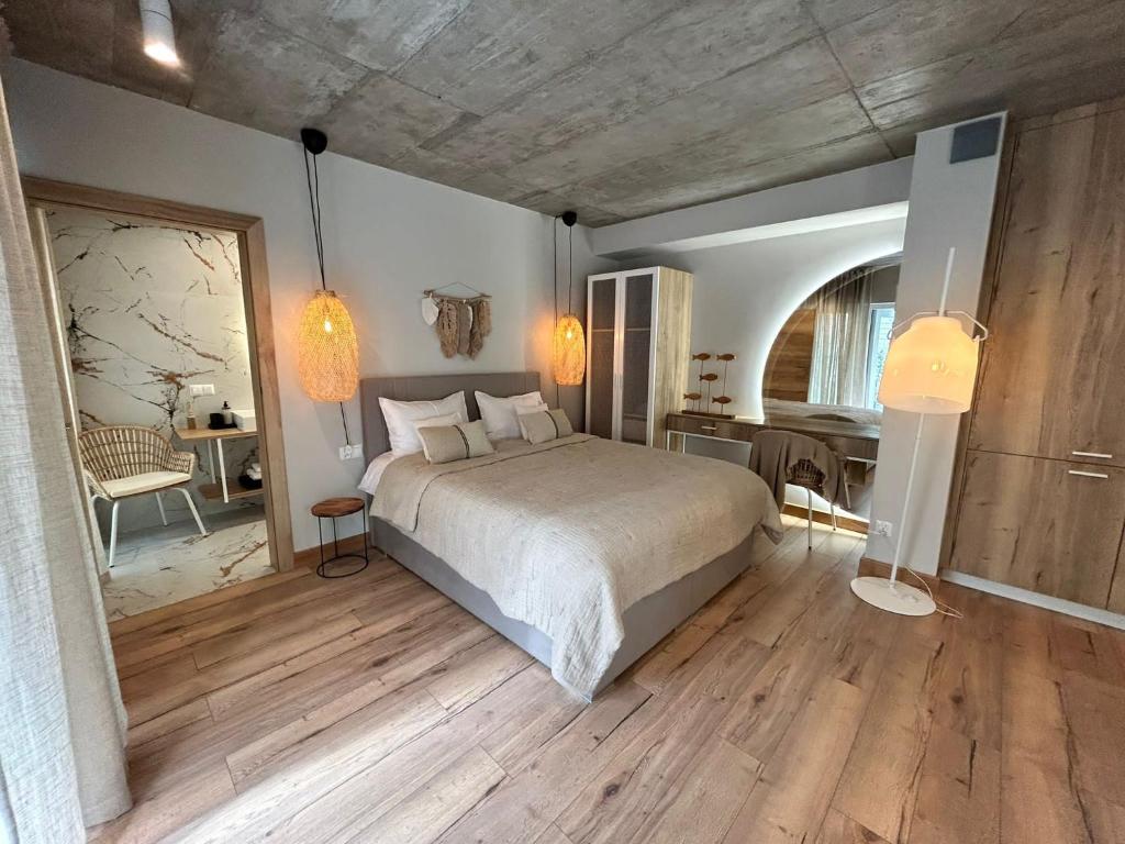 Postel nebo postele na pokoji v ubytování M2 Resort Wellness & Spa
