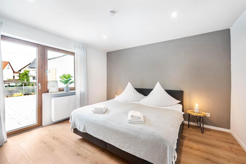 Postel nebo postele na pokoji v ubytování Casa Tortuga - Ruhige 3 Zimmer Wohnung in Hüttenfeld