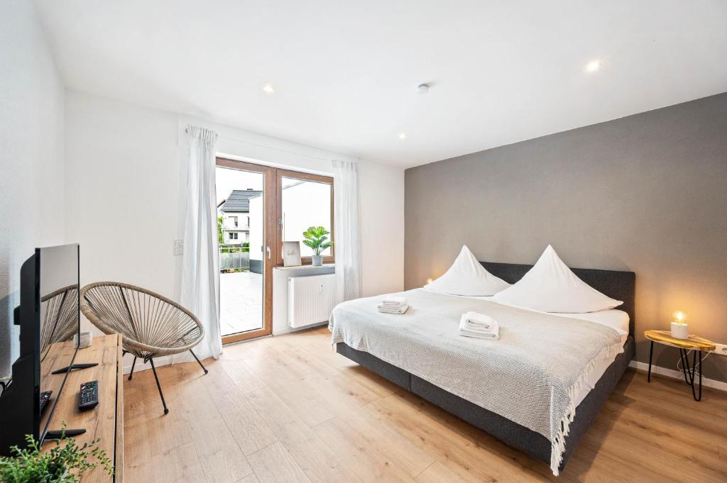 Postel nebo postele na pokoji v ubytování Casa Tortuga - Ruhige 3 Zimmer Wohnung in Hüttenfeld