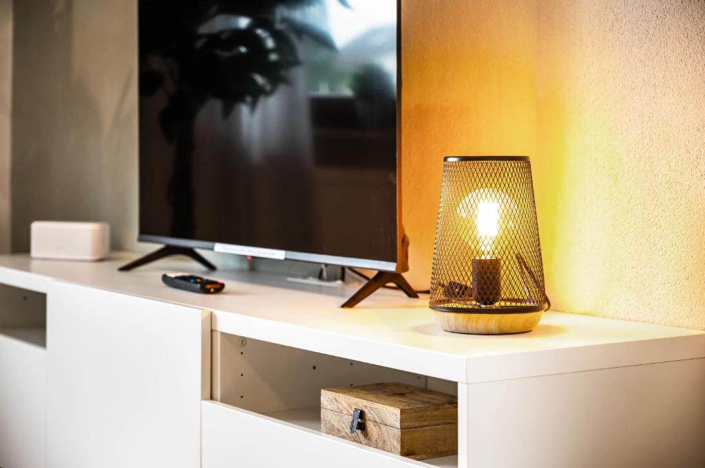 TV a/nebo společenská místnost v ubytování Casa Tortuga - Ruhige 3 Zimmer Wohnung in Hüttenfeld