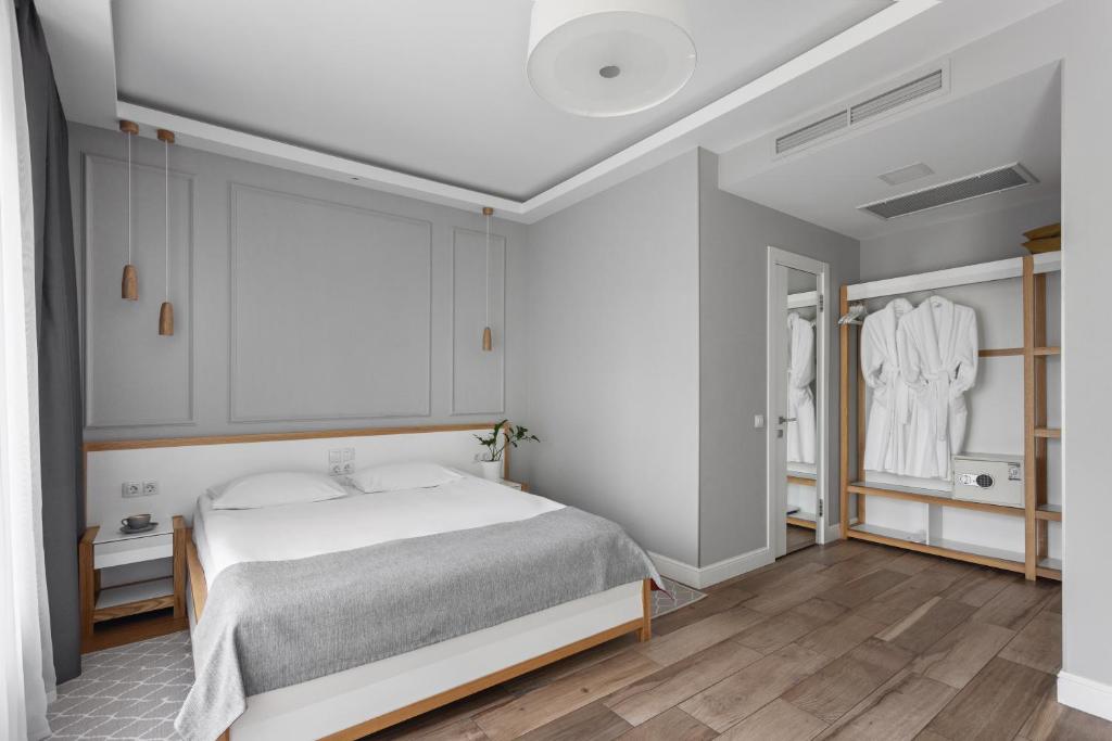 Postel nebo postele na pokoji v ubytování Frapolli 21 Hotel